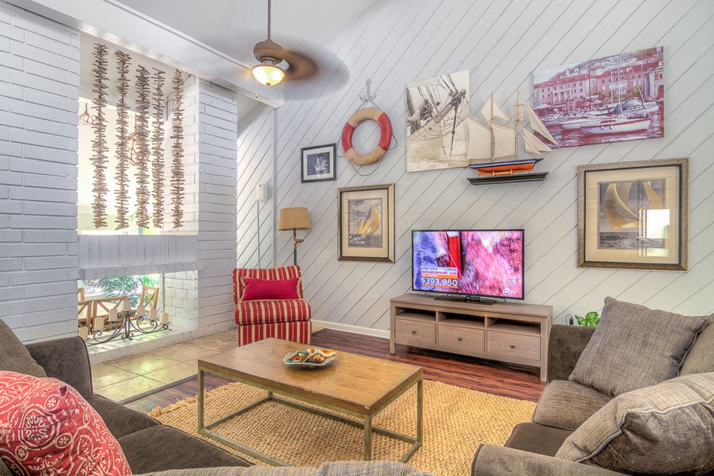 a living room with a couch and a television